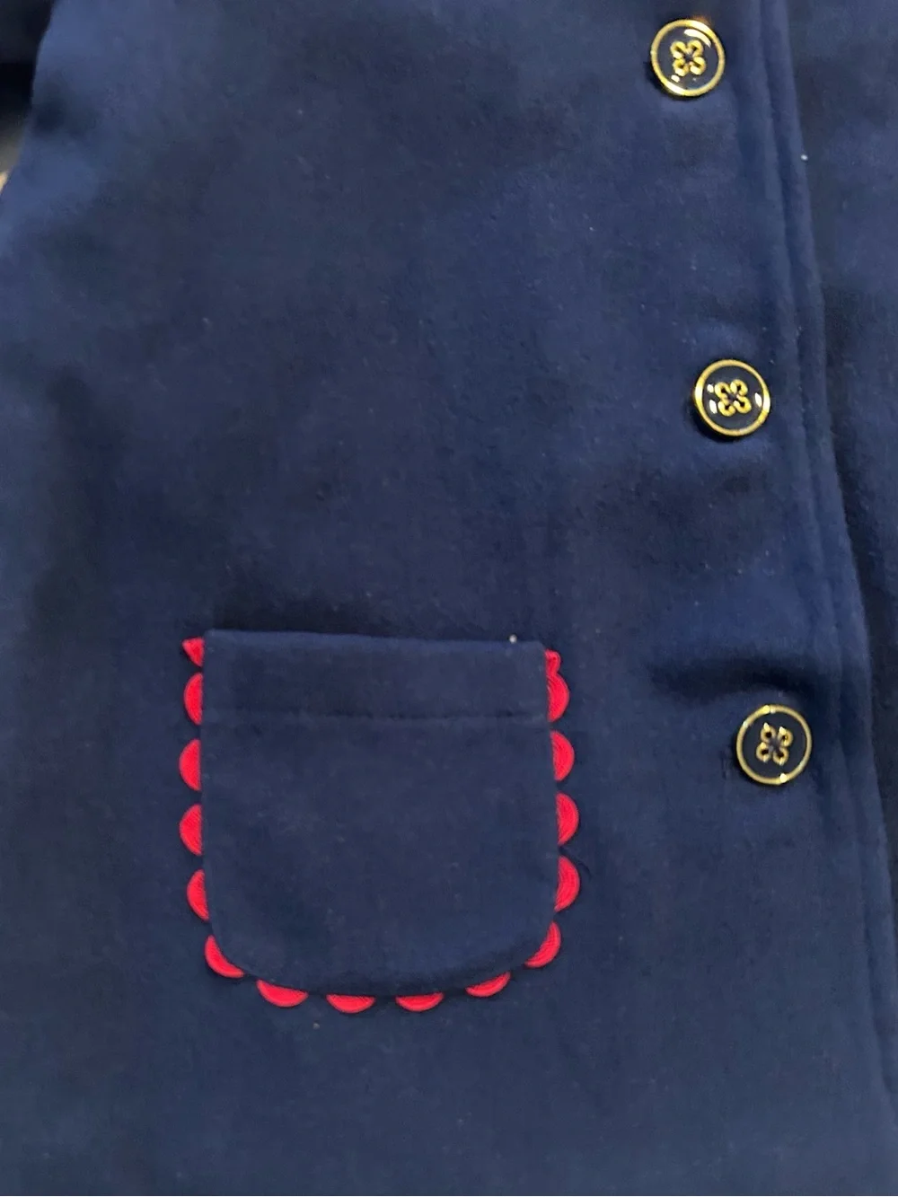 Little Me Navy Pea Coat with Red Scallop Trim and Bow.